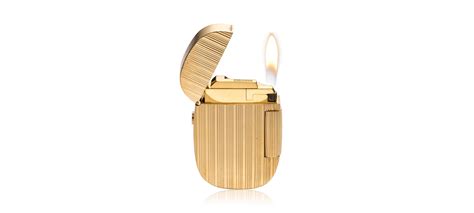 Solid Gold Vintage Patek Philippe Ellipse Lighter.